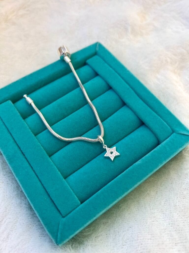 Berloque Estrela Cravej.